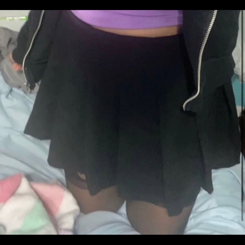 black pleated skirt